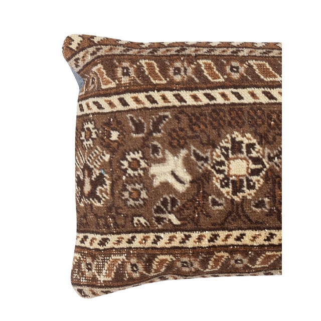 Add a touch of history and warmth to your space with this vintage handmade Turkish wool rug cushion cover. Crafted from...