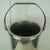 A freestanding Champagne cooling bucket made in France in the middle of the 20th century. It is made of steel with a...