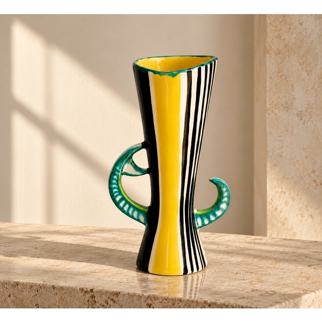 Striking french mid-century ceramic vase by gabriel fourmaintraux, signed “g.f. – fait main” underneath. the vase features...