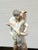 Design Plus Gallery presents a Porcelain Figurine Shepherd Boy with Goat by Fulgencio García for Lladró. The figurine has...