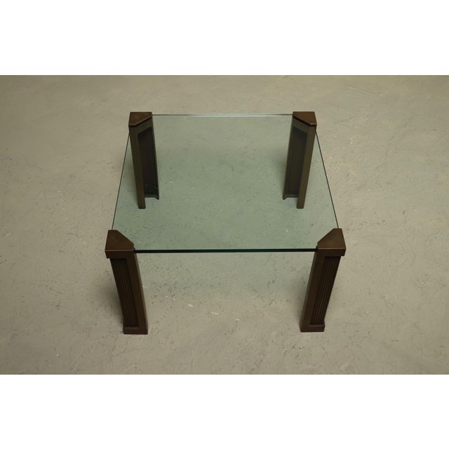 Side table model T14 designed by Peter Ghyczy in the 1970s. This piece is an example of brutalist elegance, balancing...