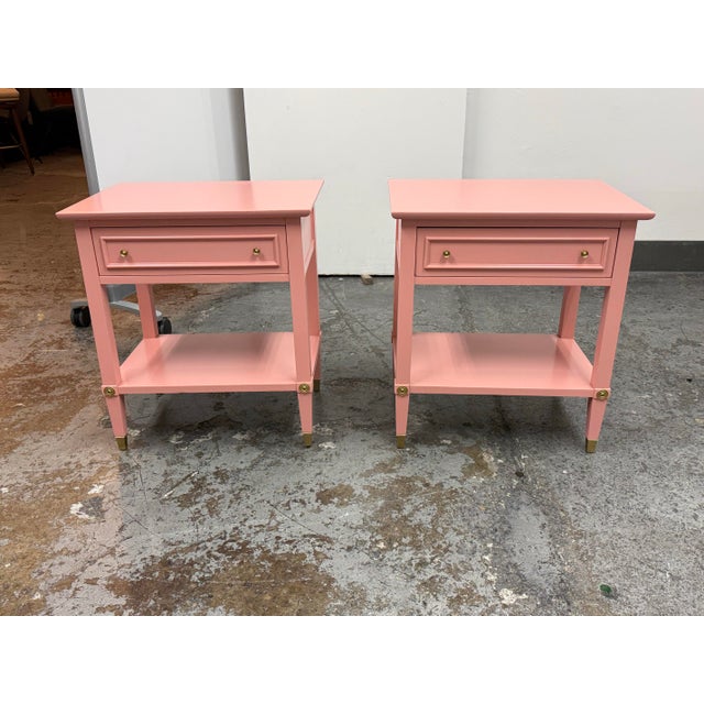 Design Plus Gallery presents a Pair of Refurbished Pink Regency Style Nightstands by Firebird Furniture. This pair has a...