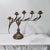 An elegant French brass candelabra executed in the sinuous botanical language of the Art Nouveau period. The sculptural...
