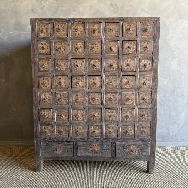 This charming vintage elm wood console is a one-of-a-kind piece with beautiful age and patina that adds character to any...