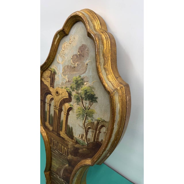 Vintage hand-painted Florentine wall plaque by Fratelli Paoletti of Florence, Italy. Features an architectural landscape...