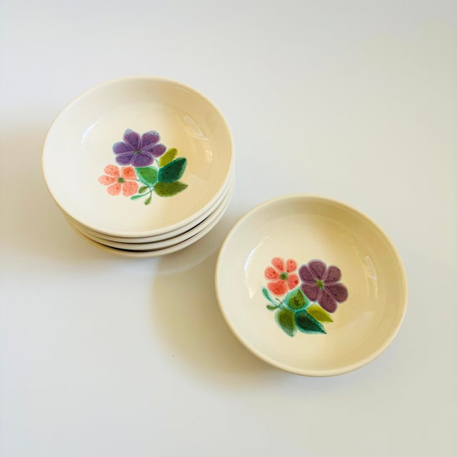 A set of 5 vintage Franciscan Earthenware pottery bowls. Lovely colorful floral design to the centers. Perfect for using...