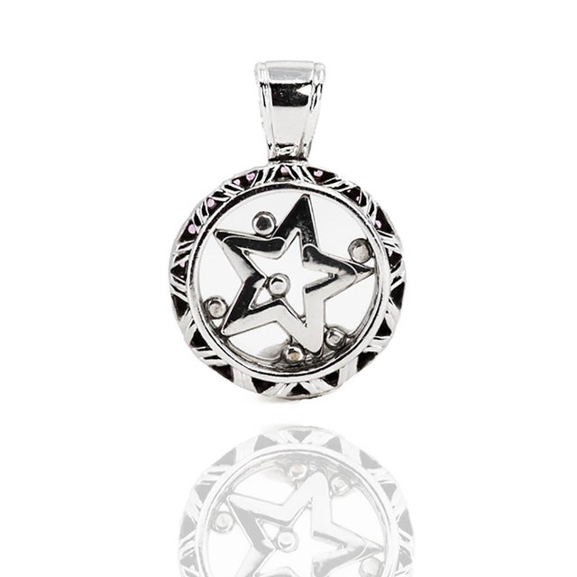 18k White gold pendant with floating diamonds, pave set floating diamond star and approximately 2.00 carats of pave set...