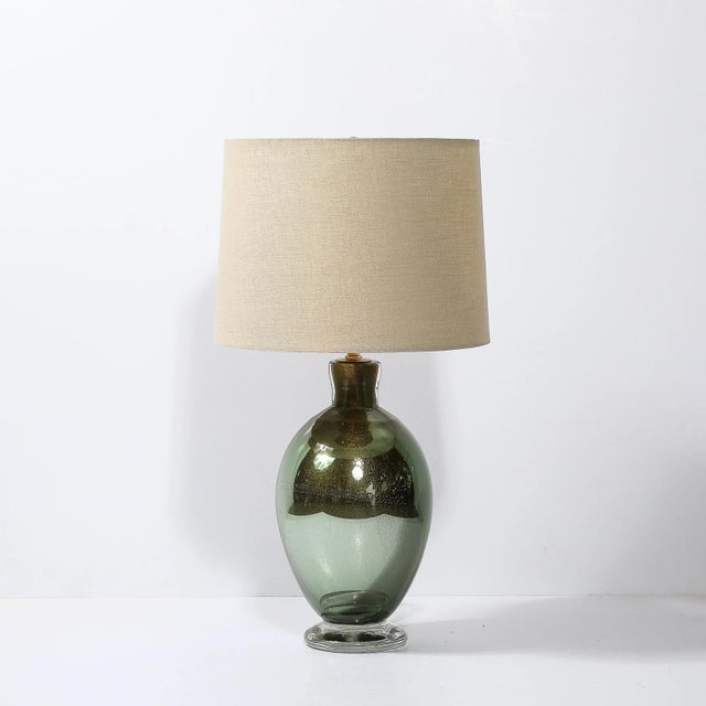 This lovely Pair of Modernist Hand-Blown Murano Smoked Emerald Glass Table Lamps W/24Karat Gold Flecks originates from...