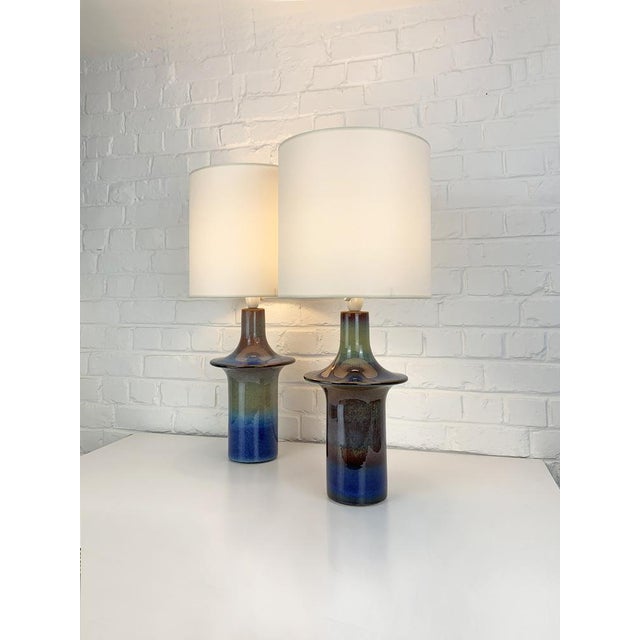 Pair tall Danish Mid-Century ceramic table lamps of the 1960-70s. Glazed stoneware. Sculptural Ufo style lamp bases, blue...
