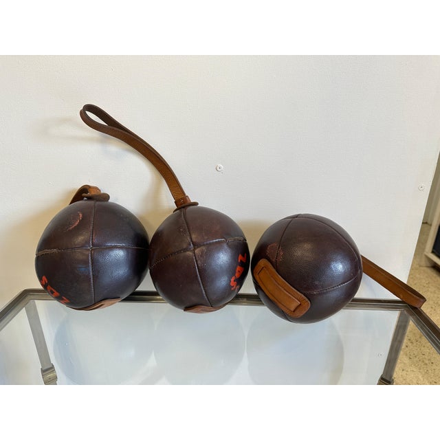 Whimsical leather ball weights (THREE AVAILABLE - sold individually) from France. Saddle leather ball with strap for...