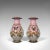 This is an antique pair of peony vases. A French, decorative ceramic baluster urn adorned with butterflies, dating to the...