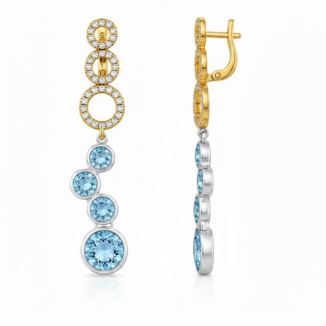 Contemporary Silver Sky Blue Topaz Earrings. Asymmetrical Sky Blue Topaz Drop Earrings. Zigzag Sky Blue Topaz Drop...