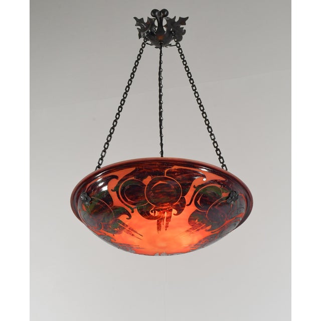 Charles Schneider - Le Verre Français A wonderful French art deco hanging fixture in wrought iron with a large Schneider...