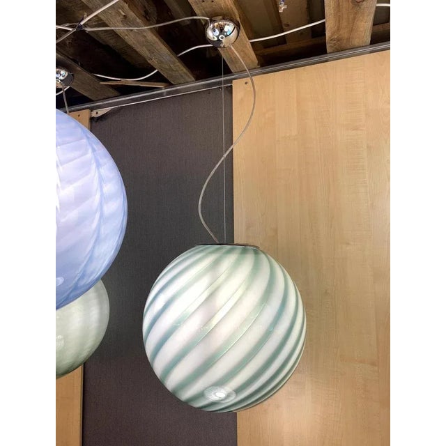 Impressive contemporary Milky-Green Sphere in Murano Glass Swirl. Design in very particular and effective movement. Very...
