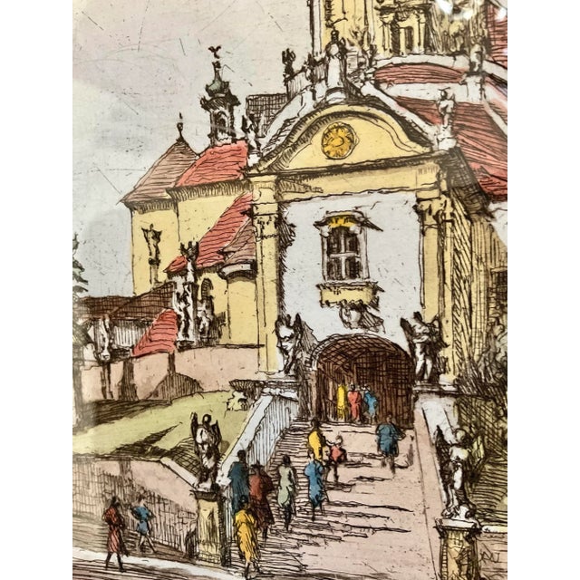 This is a nice classical etching, hand colored and signed by the artist. The subject of the etching is a famous church...