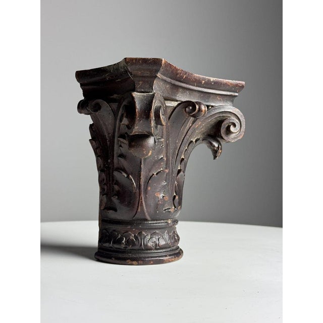 Subtle small hand carved capital. Corinthian style. 19th century. Beautiful patina. Beautiful as decoration on a table or...