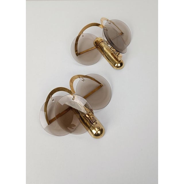 I am offering for sale a pair of super glamorous sconces that bring to mind the smoky clubs of the 70s in Rome such as...