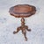 Table with a round inlaid plane with rough edge and tripod at the base. Italy 1960. Measures 55.5 x 55.5 x H 60. Table...