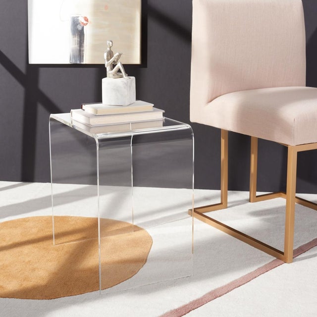 An elegant expression of upscale minimalism, this Pryor Side Table abounds with airy depth and dimension. Pryors crystal...