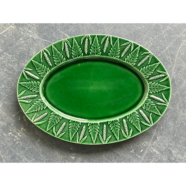 Imbue your dining experience with the lush, verdant beauty of this vintage Italian ceramic serving platter. Finished in a...