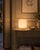 The exquisite peonia table lamp by la murrina murano is crafted from cream-colored glass with white filigree. The master...