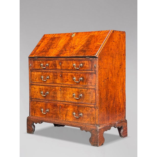 Untouched 18th Century George III Period Figured Mahogany Bureau This charming late 18th-century George III period finely...