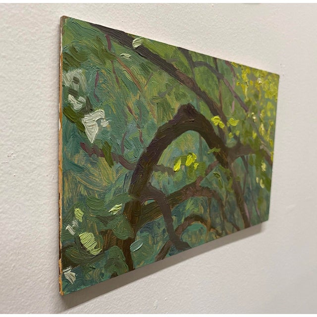 In "Komorebi," intricate layers of green and brown capture the interplay of light filtering through a canopy of leaves,...