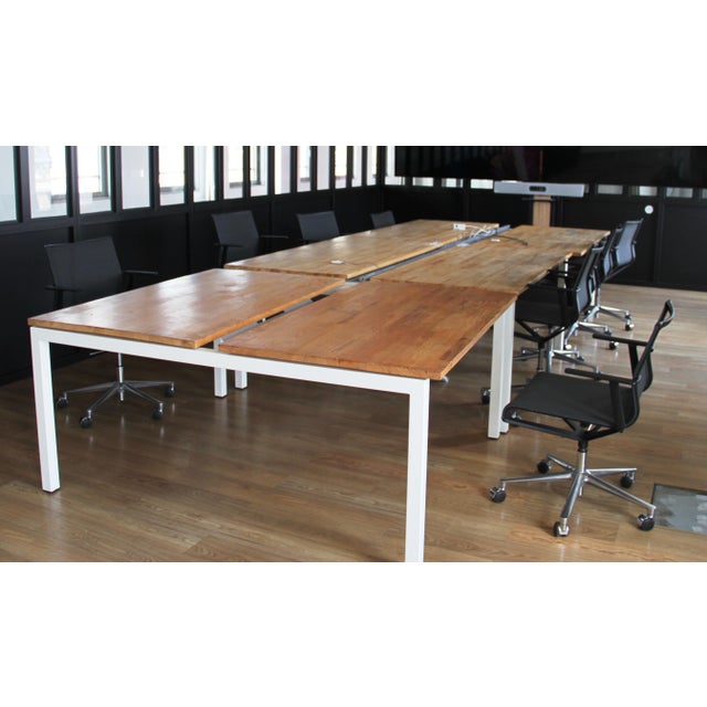 ICF office chair. Metal frame, black mesh seat, and plastic armrests. Swivel, height-adjustable chair with casters....