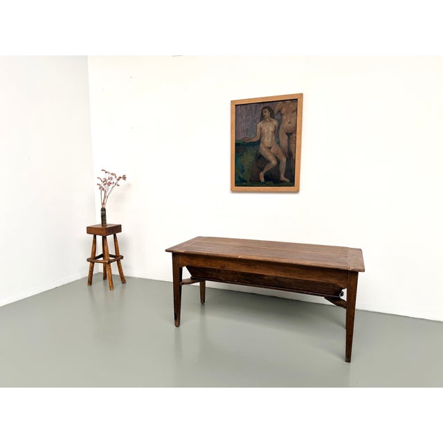 Maison lecan presents this solid oak farmhouse table, a former kneading trough, france, circa 1920. Originally designed...