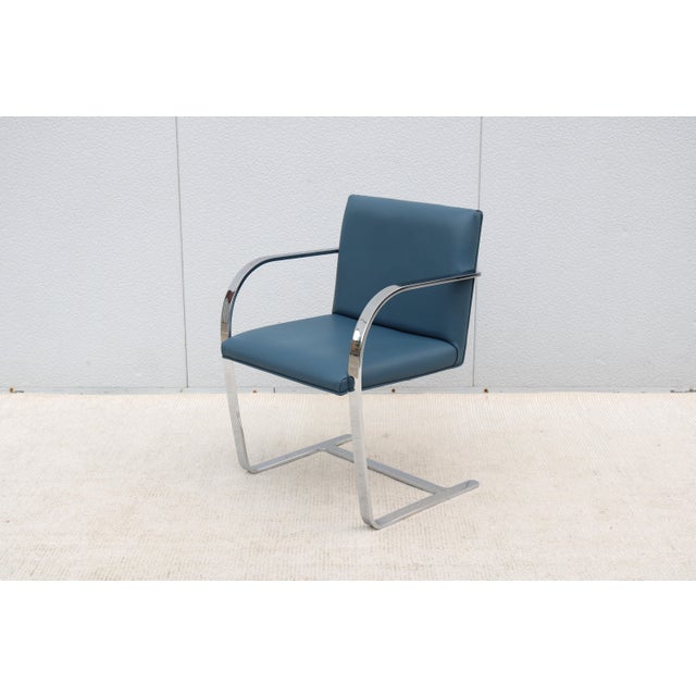Fabulous Brno flat bar chair in indigo blue vinyl. An icon of modernist classic heavily rooted in the Bauhaus design,...