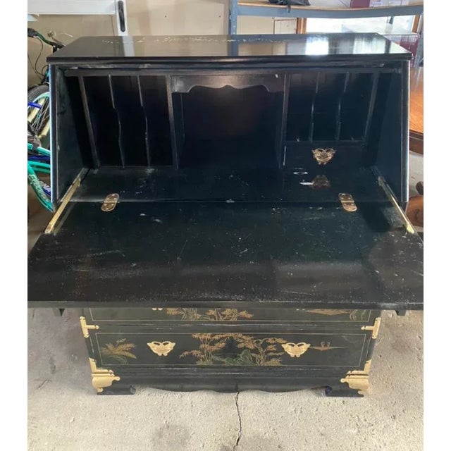 This beautiful lacquered Asian style drop front desk in very good condition. The desk has brass, butterflies and...