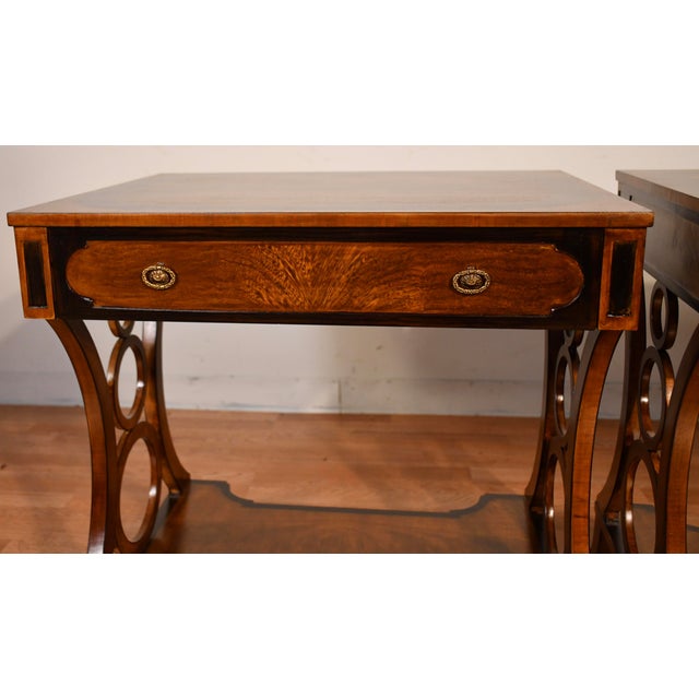 We are pleased to offer this beautiful Pair of Regency style side tables by Maitland Smith, from the 1980s. This pair is...