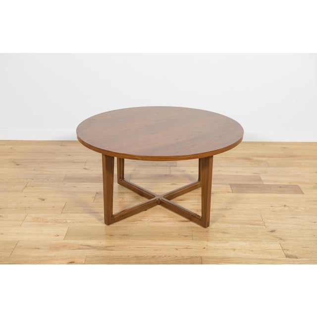 This round coffee table was manufactured by the British Remploy factory in the 1970s. The teak wood has been completely...