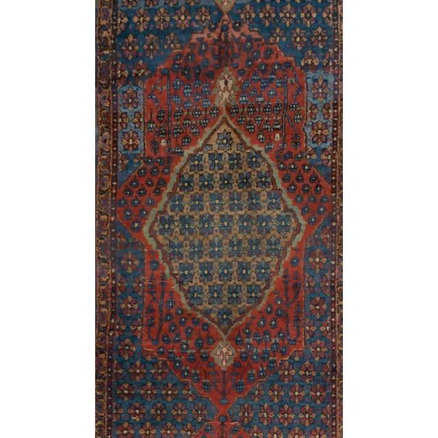 A beautiful hand-knotted rug, traditionally crafted by skilled artisans using fine-quality wool. The hand-knotted...