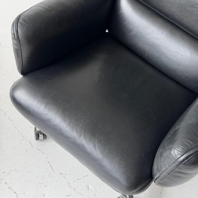 c. 1980s. USA. Black leather upholstery with padded cushions This piece is attributed to the mentioned designer/maker. It...