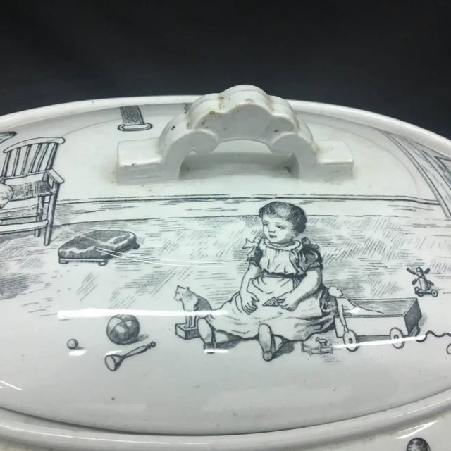 English white and black rare soup tureen made by Brownfield & sons, circa 1870, very particular decor with different scenes.
