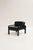 Model 54 armchairs designed by Gae Aulenti and produced by Knoll International. All-black models with a metal frame and...