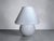 Large mushroom lamp in opal white glass with an elegant mushroom swirl decoration, Murano, 1970s. This table lamp embodies...