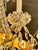 This 19th century Italian Empire gilt tole and crystal chandelier exudes elegance and sophistication. Featuring glistening...