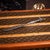 Antique ​20th Century silver plated and brass letter opener designed as a peacock with its tail neatly folded. A...