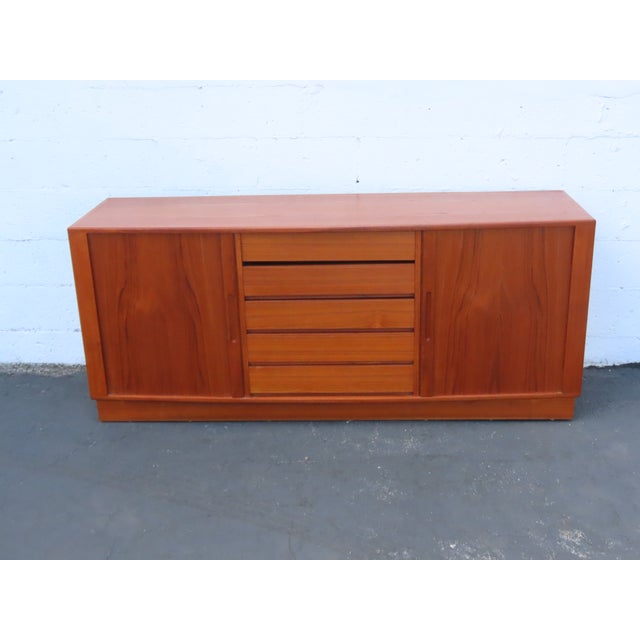This magnificent Sideboard is made of wood, teak wood, and teak veneer. This wonderful Cabinet is an excellent example of...