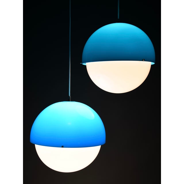 Luigi Bandini Buti model 4021 blue metacrilato pendant lamp for Kartell, Italy, 1960s A striking Space Age pendant lamp...