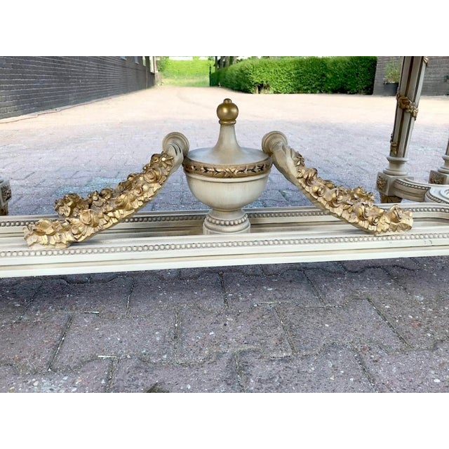 Late 20th Century French Louis XVI Style Cream & Gold Center Table Elevate your interior with the refined grandeur of this...