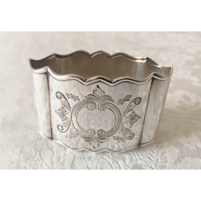 Ostfriesen Silver Plate Scalloped Ornate Vintage Napkin Ring. It is in Mint Condition.