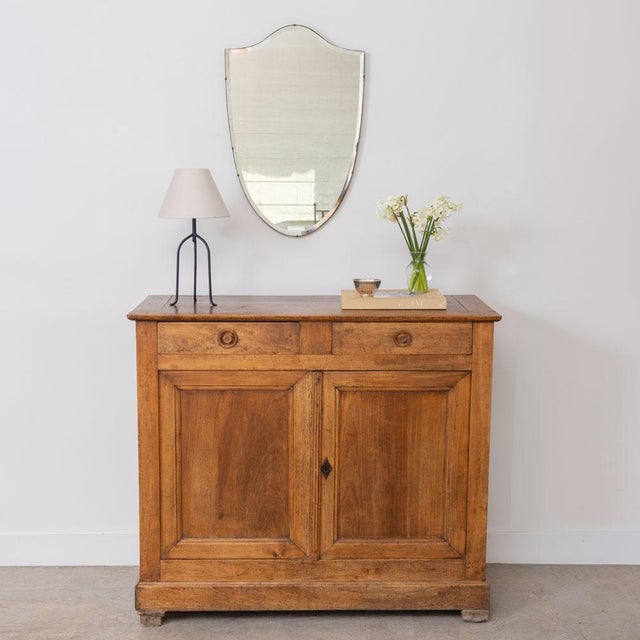 Beautiful oak cabinet from France, late 19th century. Lovely carved wood detailing on front doors with interior shelf and...