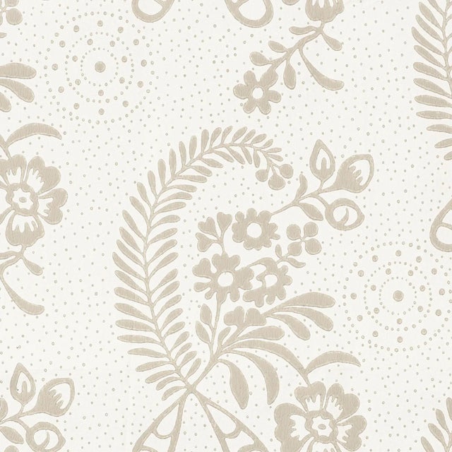 Derived from a handblock document, this beautiful surface printed wallpaper is a delicate design with subtle tonal...