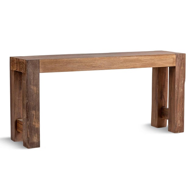 Rustic salvaged wood console table. Simple design with thick beam legs. Natural grain and textures which will vary with...