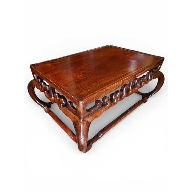 19th Century Chinese Huali Kang Small Low Table Dimensions L 30” x D 21.25” x H 13.25” An intricately carved small Huali...