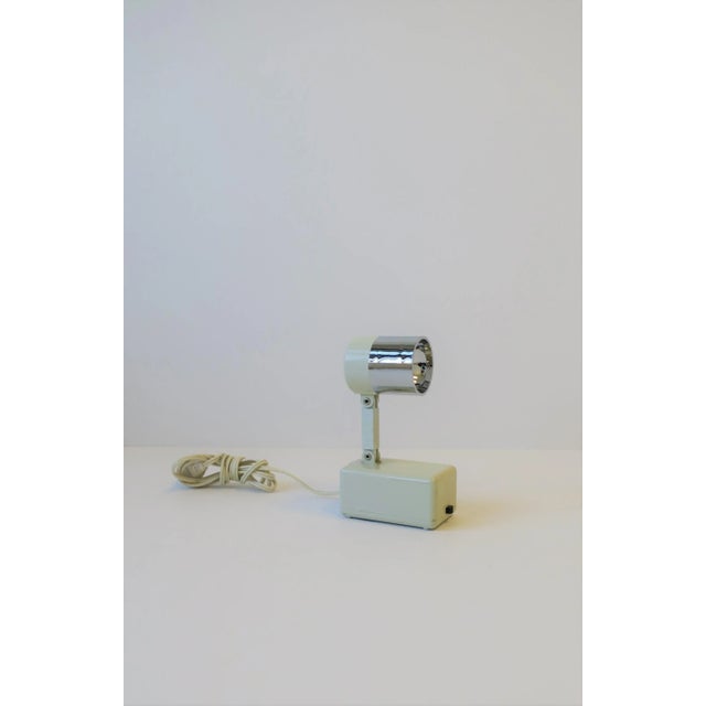 A small Postmodern period spot-light or wall light with adjustable head and neck. Light, aka the 'Tooth Flox' 'Lamp 2',...