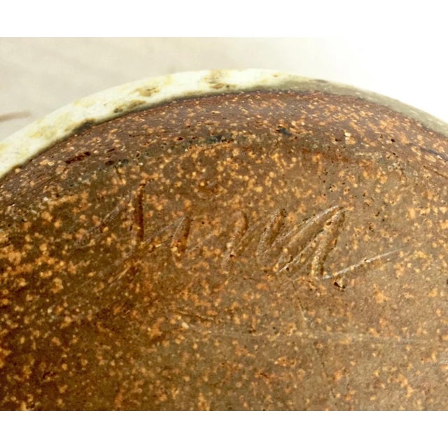 we have for your consideration a very beautiful mid century modern studio art pottery. this piece of pottery consists of a...